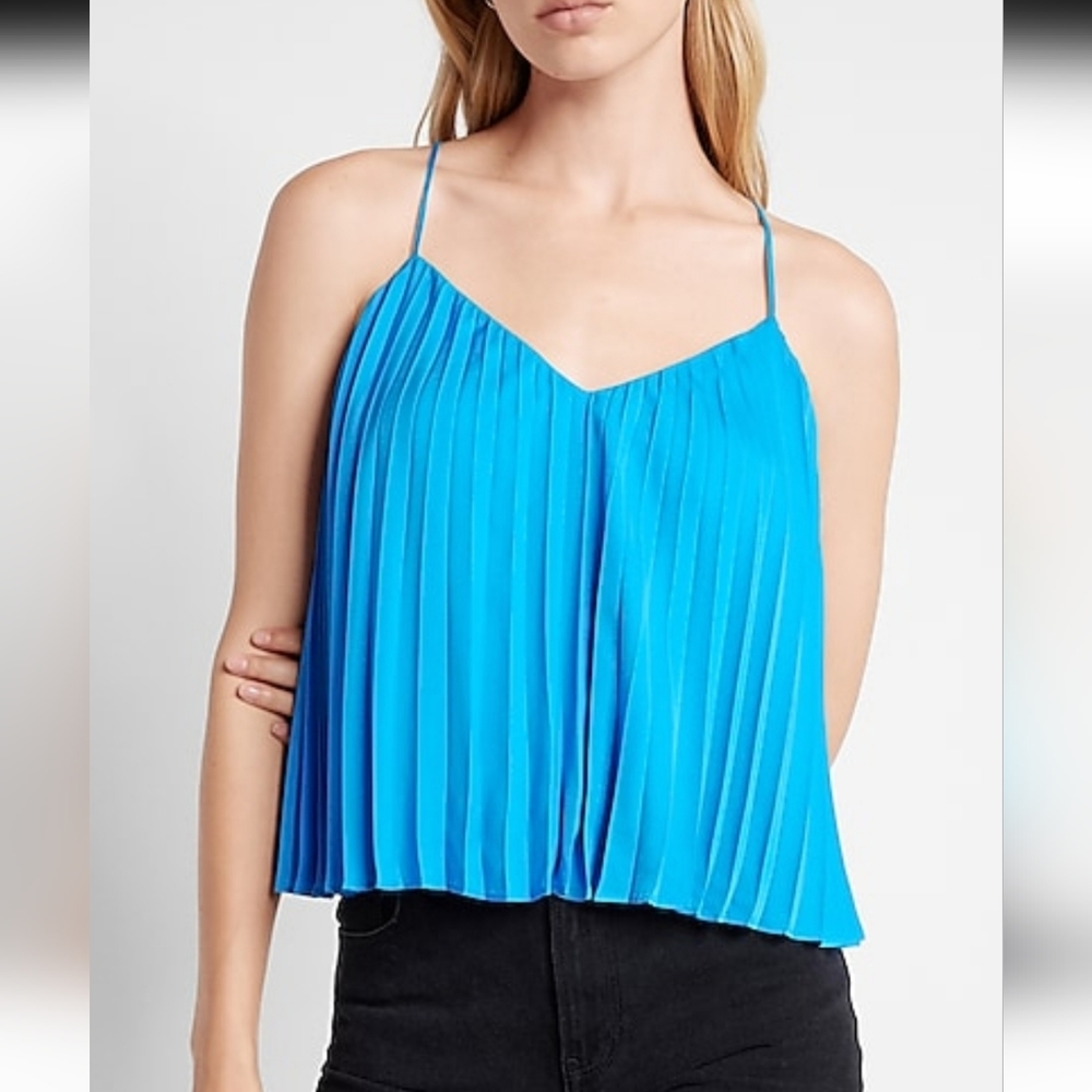 Blue top.in very good condition. Never been used. It's a V neck cami top